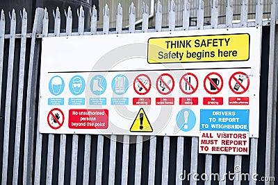 Think safety sign board at construction building site entrance Stock Photo