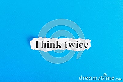 Think twice text on paper. Word Think twice on torn paper. Concept Image Stock Photo