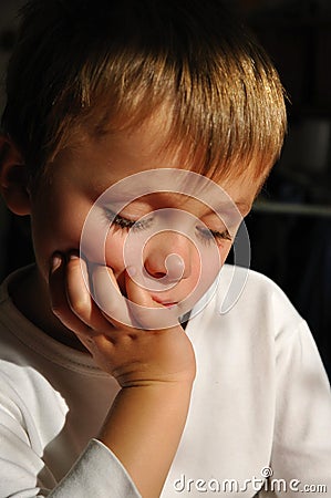 Thinking boy Stock Photo