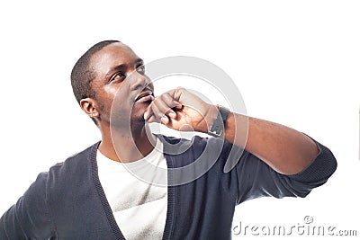 Thinking casual dressed black man with blue sweater. Stock Photo