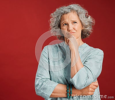 Thinking, confused and wondering woman looking puzzled, unsure and uncertain about choice, decision and idea in mind Stock Photo