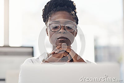 Thinking, decision and business woman on computer for solution, research and serious, focus or job planning. Reading Stock Photo