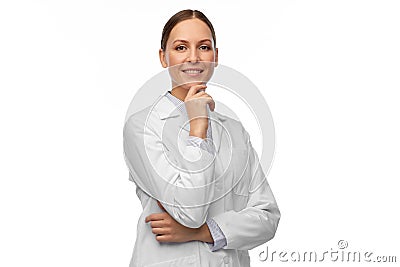 Thinking female doctor or scientist in white coat Stock Photo