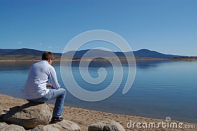 Thinking on the Lake Shore Stock Photo