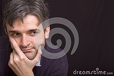 Thinking man with short beard Stock Photo
