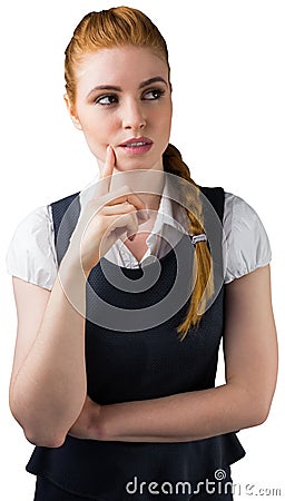 Thinking pretty redhead businesswoman with finger on chin Stock Photo