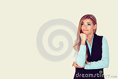 Thinking skeptical. Closeup portrait woman thinking, daydreaming looking up, hand fist on chin thoughtful having doubts. Isolated Stock Photo