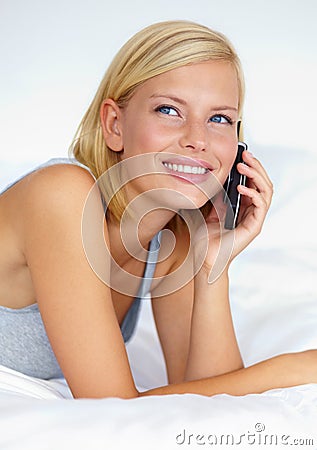 Thinking, smile and phone call with woman on bedroom for contact, communication and connection. Happy, digital and Stock Photo