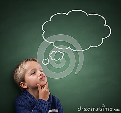 Thinking with thought bubble on blackboard Stock Photo