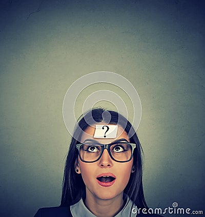 Thinking woman with question mark Stock Photo