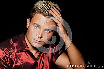 Thinking young handsome man. Studio fashion portrait. Stock Photo