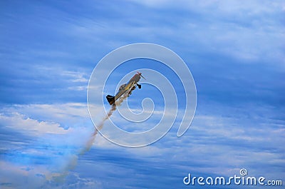 Third AirFestival at Chaika airfield. The plane is rapidly takes off in high and leaving behind it a long plume of smoke Editorial Stock Photo