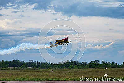 Third AirFestival at Chaika airfield. A small sports plane takes off in an unusual way. Editorial Stock Photo