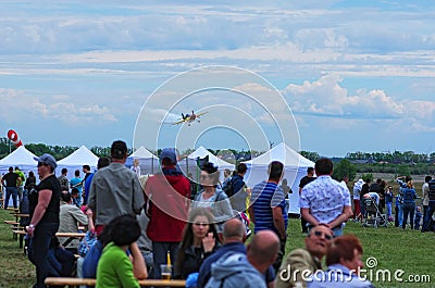 Third AirFestival at Chaika airfield. The sports plane comes on landing after the performance Editorial Stock Photo