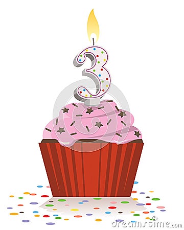 Third birthday cupcake with lit candle in shape of number three Stock Photo