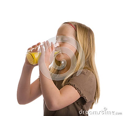 Thirsty Girl Drinking Orange Juice Stock Photo