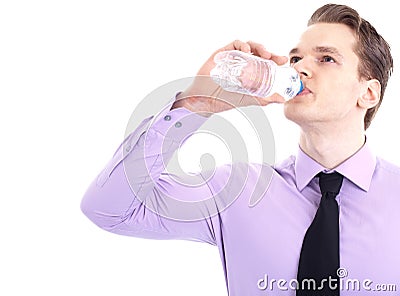 Thirsty young businessman Stock Photo