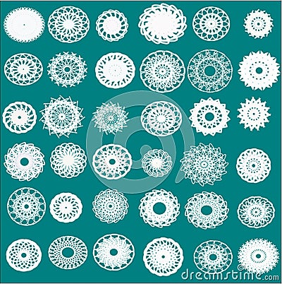 Thirty-six different white snowflakes, flowers and napkins on a bright green background Stock Photo