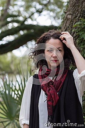 Thirty-something woman looking into the distance Stock Photo