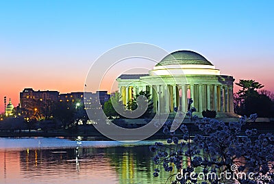 Thomas Jefferson Memorial and Capitol Building at predawn during cherry blossom festival. Stock Photo