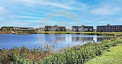 Beautiful lake at river Maas with new luxury vacation resort Stock Photo