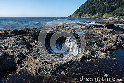 Thors Well, a natural rock feature in Cape Perpetua on the Oregon Coast Stock Photo