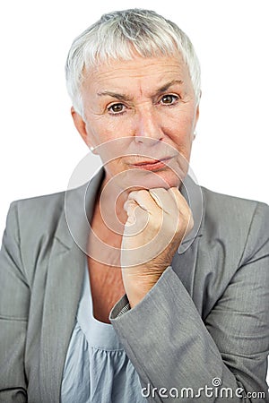 Thoughful woman looking at camera Stock Photo