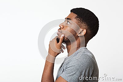 Thoughtful african-american man profile portrait on white Stock Photo