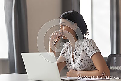 Thoughtful anxious asian business woman looking away thinking solving problem Stock Photo