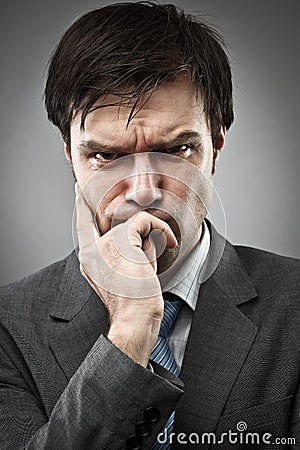 Thoughtful businessman Stock Photo