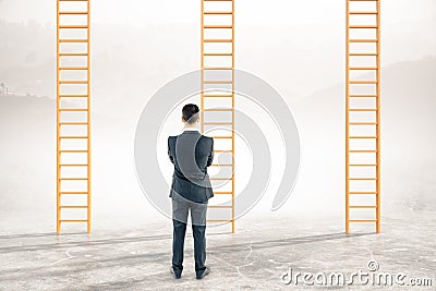 Thoughtful businessman career ladders Stock Photo