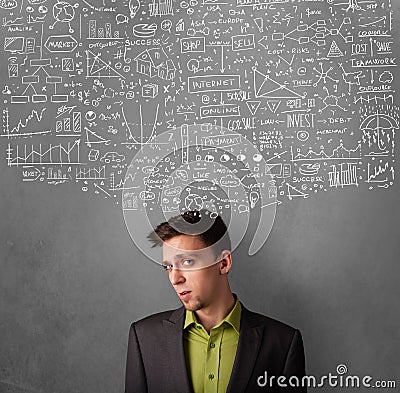 Thoughtful businessman with charts above his head Stock Photo