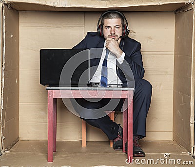 Thoughtful businessman sitting in the office Stock Photo