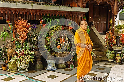 Thoughtful, contemplative monk in the shrine. Editorial Stock Photo