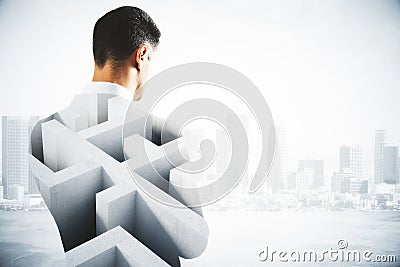 Thoughtful man with maze Stock Photo