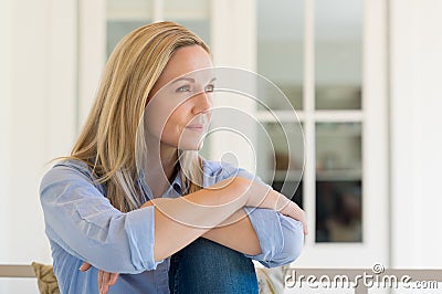 Thoughtful mature woman Stock Photo