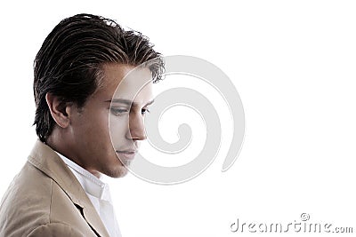 Thoughtful wistful young man Stock Photo