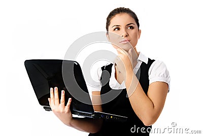Thoughtful woman with a laptop Stock Photo