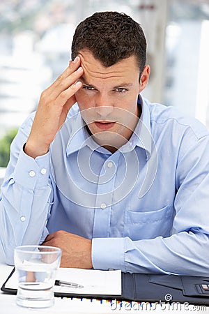 Thoughtful young businessman Stock Photo