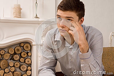 Thoughtful young man seeking inspiration Stock Photo