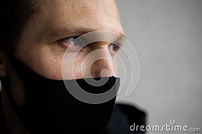 Thoughtful Young Student Guy In Medical Protective Mask On Street Portrait Coronavirus Stock Photo