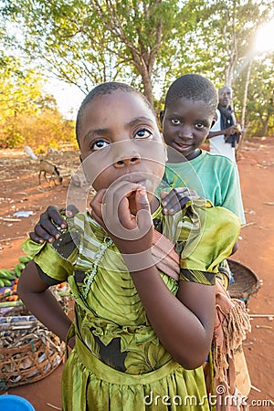 Thoughtfull African child with friend Editorial Stock Photo