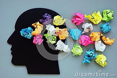 Thoughts, ideas and mindfulness concept. Head and paper balls Stock Photo