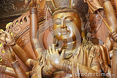 Thousand hands Buddha statue Stock Photo