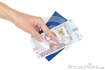 Thousand hryvnias by one banknote in the hand, isolated Stock Photo