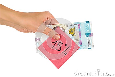 Thousand hryvnias and sticker with different financial signs and symbols in the hand, isolated Stock Photo