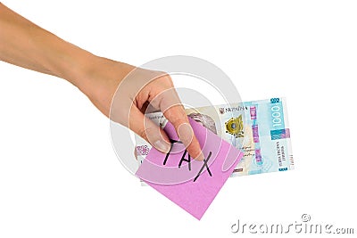 Thousand hryvnias and sticker with different financial signs and symbols in the hand, isolated Stock Photo