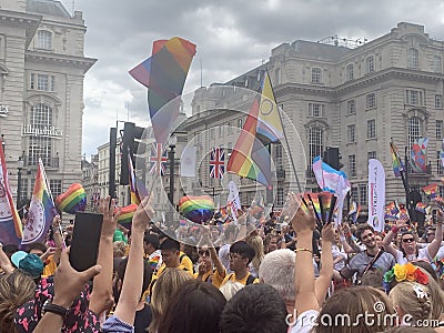 Thousands of gay activists with LGBT flags at the Pride parade in London , England 2023 Editorial Stock Photo