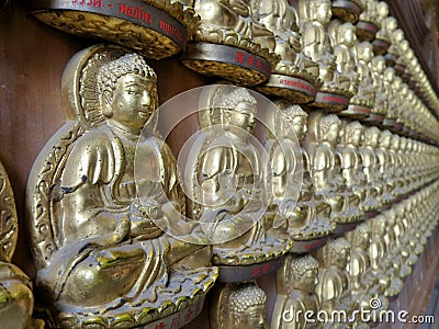 Thousands of small Buddha images in Meun Buddhasukkhavadi Hall Stock Photo