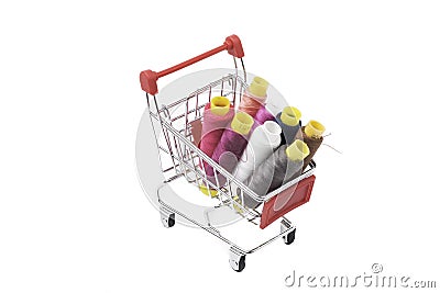 Thread coils in a trolley isolated on white background. sewing kit Stock Photo
